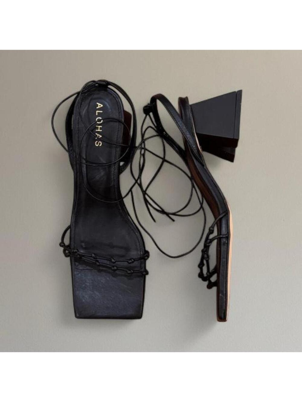 Alohas leather strappy block heel sandals.